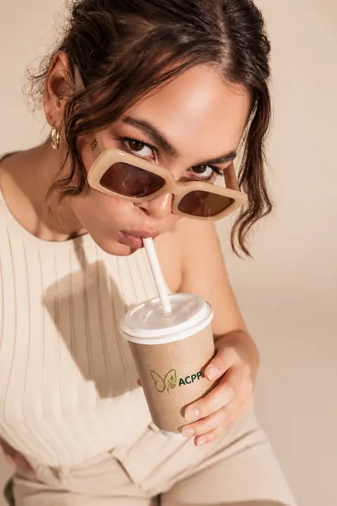Customer sipping through an ACPP compostable straw